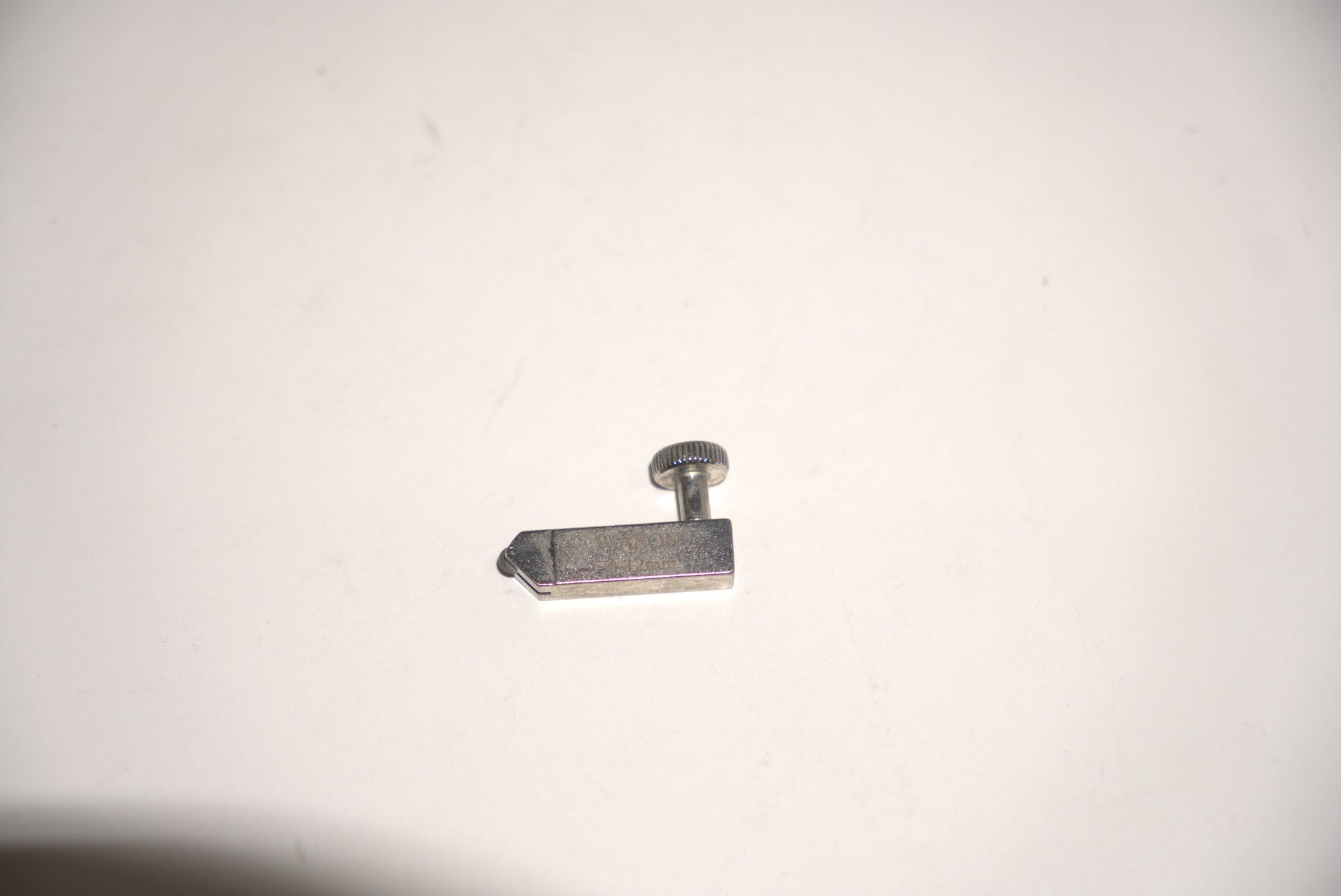 Small glass cutter replacement by Best Glass Parts, showing the compact cutting tool with a metal wheel for precise glass scoring.