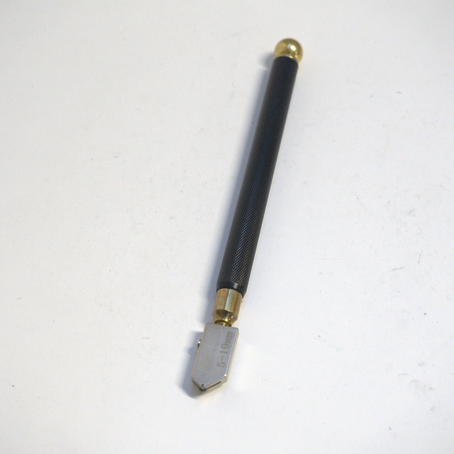 Black glass diamond cutter pencil with metal body for precise glass cutting, by Best Glass Parts.