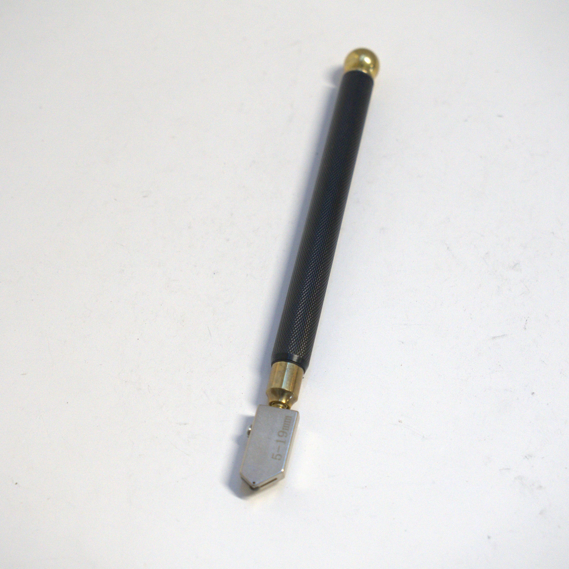 Black glass diamond cutter pencil with metal body for precise glass cutting, by Best Glass Parts.