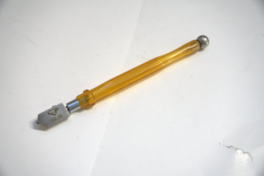 Orange glass diamond cutter pencil from Best Glass Parts, showing its ergonomic design and precision tip for glass cutting.