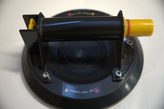 Black glass suction cup from Best Glass Parts, single piece with a strong grip for secure attachment on smooth surfaces.