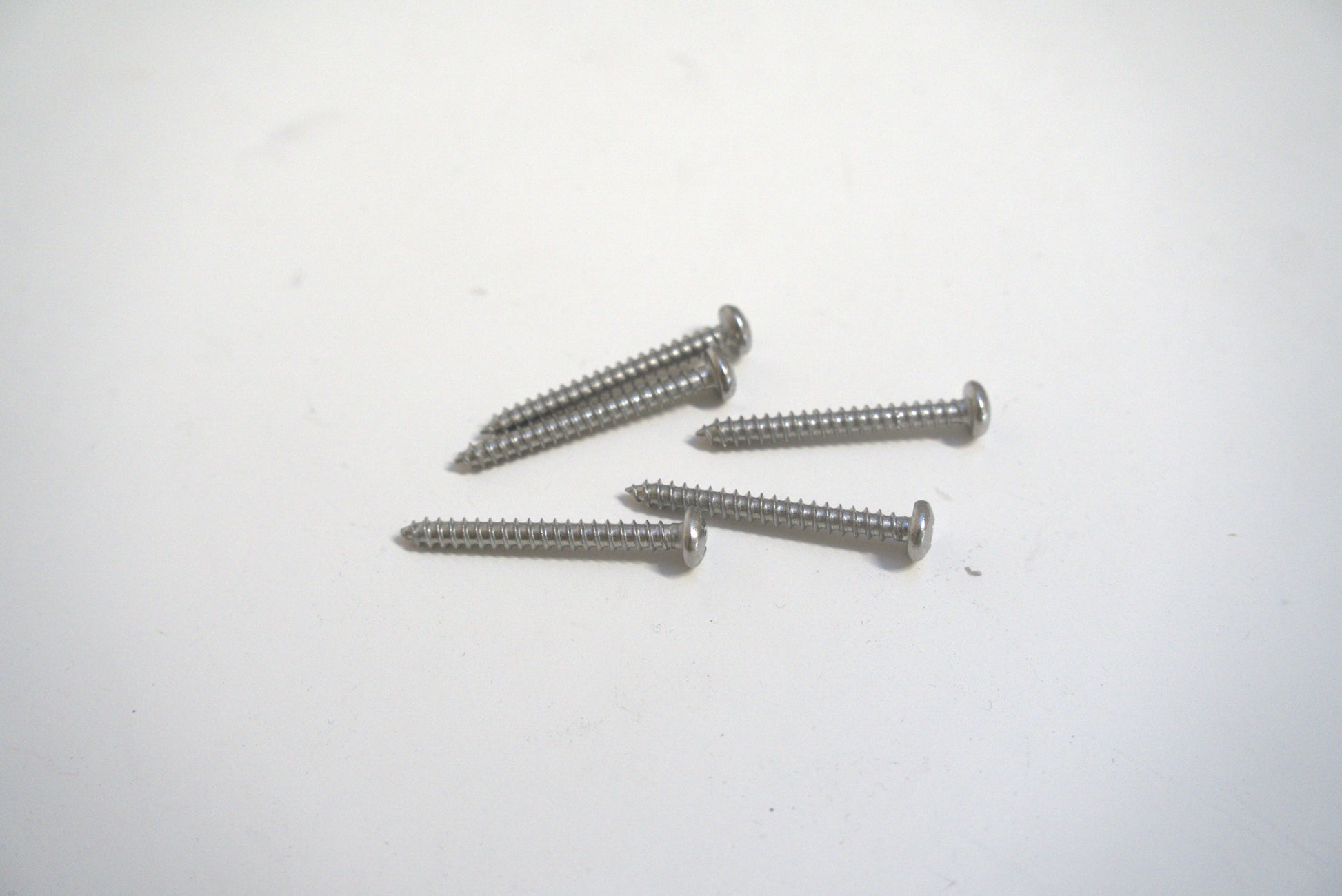 Long 1 5/8-inch sheet metal screw by Best Glass Parts, showing a close-up of the threaded screw with a shiny metal finish.